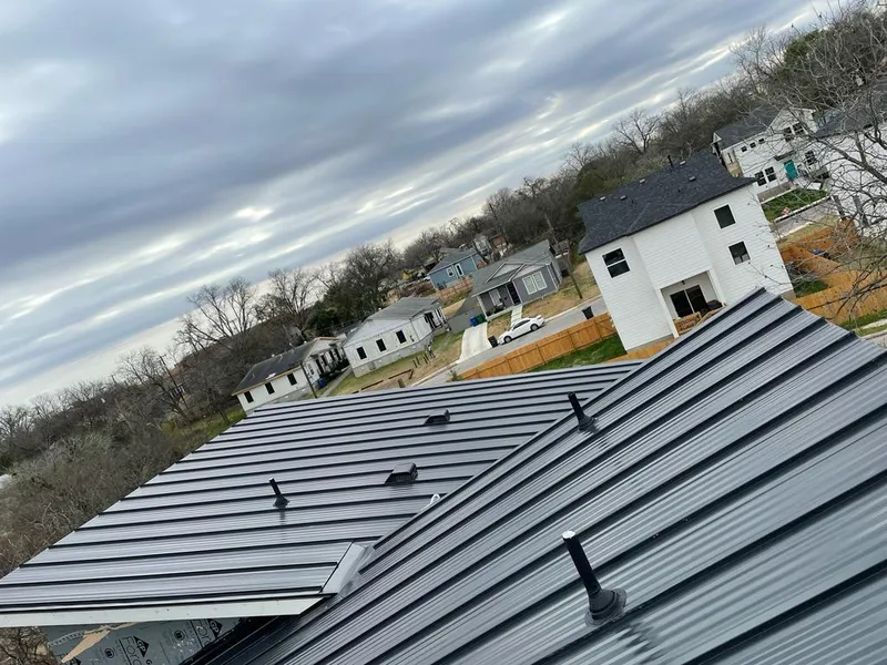 Standing seam metal roof panels with vents for Skylight Repair in Spokane Valley